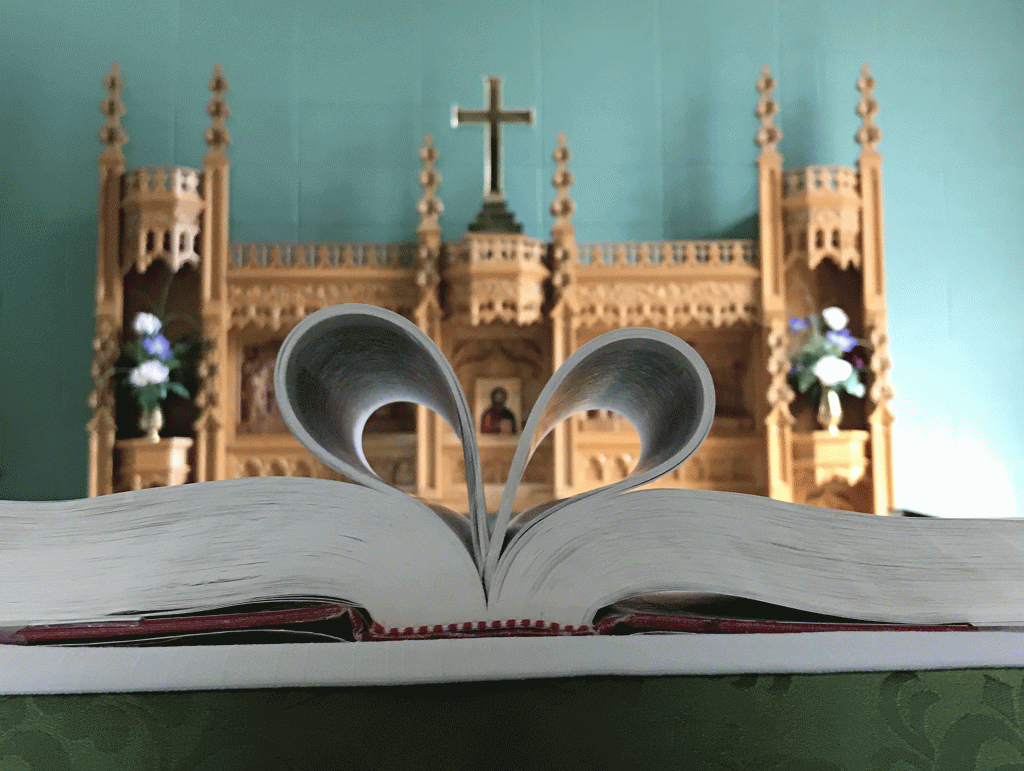 A bible sits on the altar in the Nativity's Chapel of the Holy Family; its middle pages are turned inward to look like a heart.