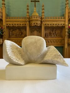A sculpture of the wings of the Holy Spirit.