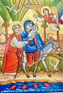 Coptic Icon of the Flight Into Egypt: Mary carries Jesus while riding on a Donkey, with Joseph walking beside and being led by an angel